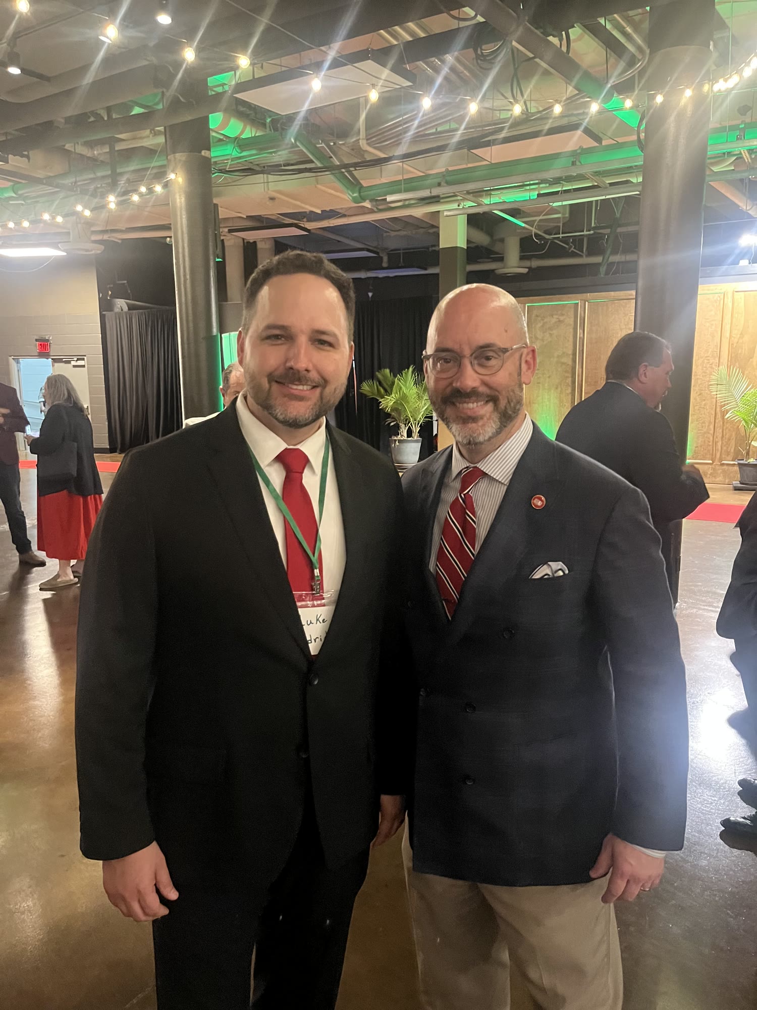 Luke Eldridge with a community leader